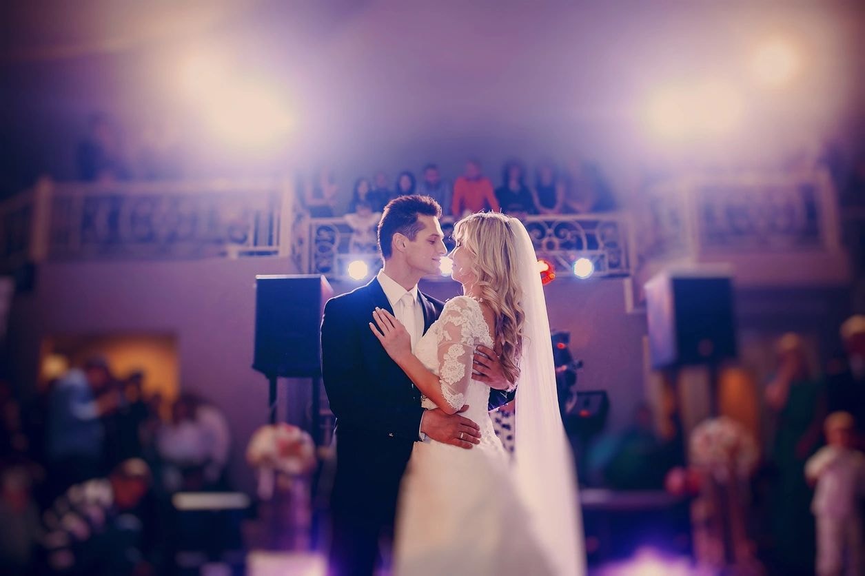 Bride and groom dancing at wedding reception
